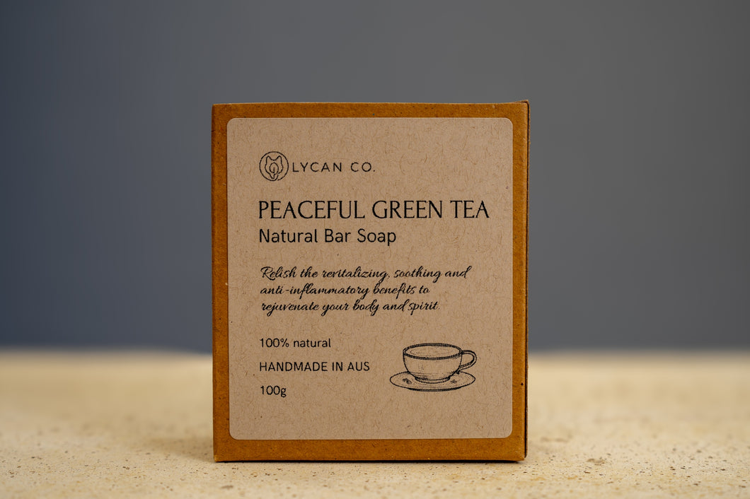 Eco-friendly package of LycanCo Peaceful Green Tea Bar Soap listing green tea and essential oils among ingredients.