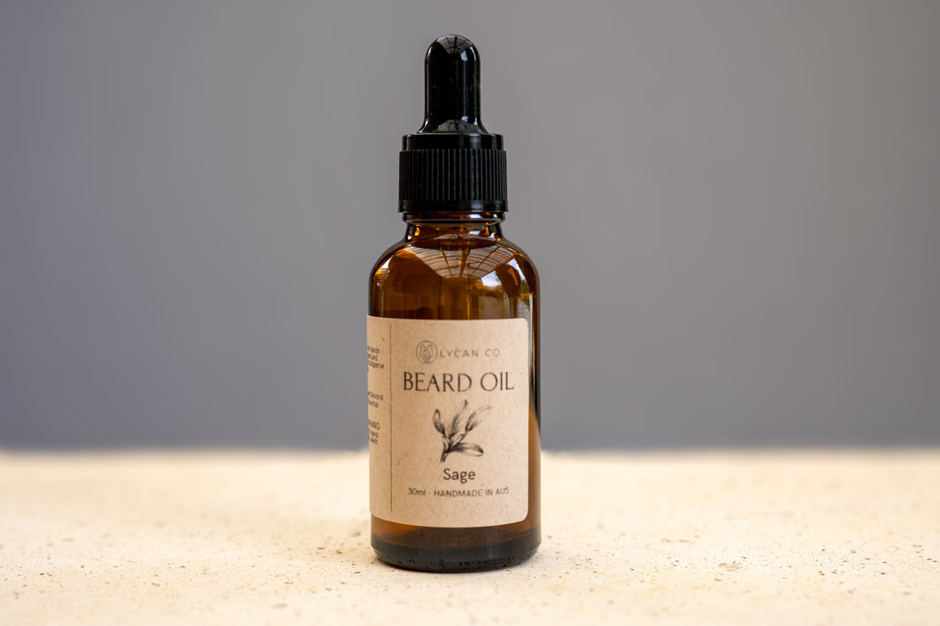 Earthy LycanCo Sage Beard Oil bottle on a marble counter top.