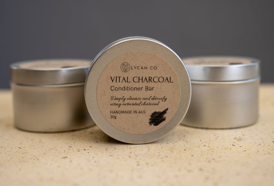 LycanCo Vital Charcoal Conditioner Bar, showcased in a sleek container, ideal for detoxifying and revitalizing hair.